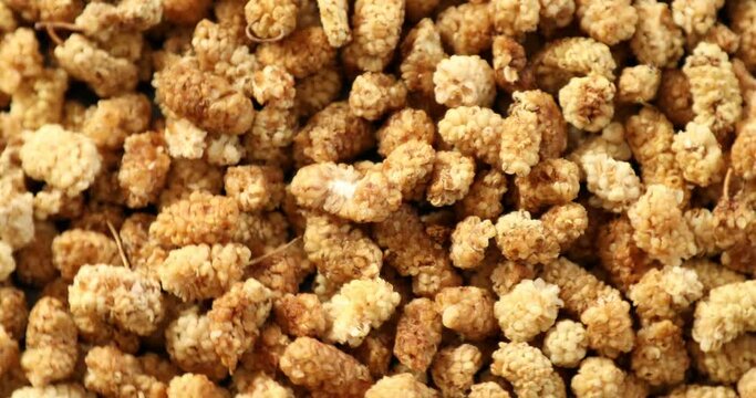 Top wiev of dried mulberry berries close up