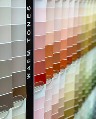 Paint swatches, warm color tone samples in a row.