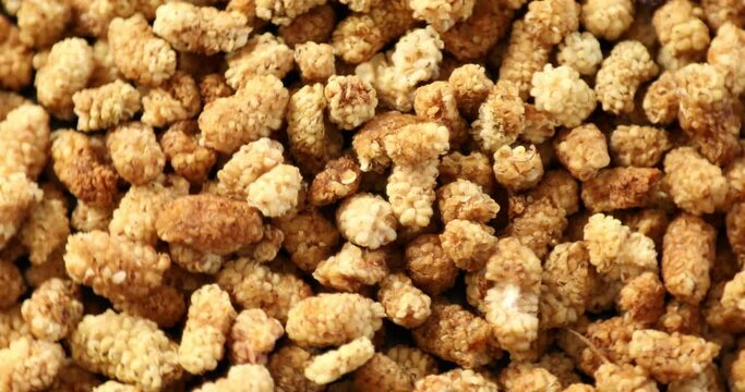 Top wiev of dried mulberry berries close up