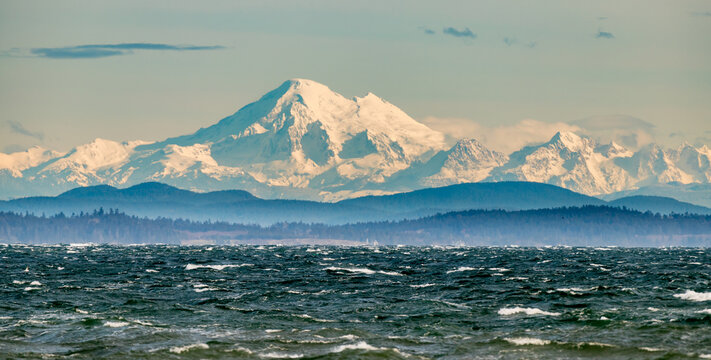 Mount Baker In Washington State As Seen Across The Water From Victoria British Columbia, Canada On A Clear Winter Day.