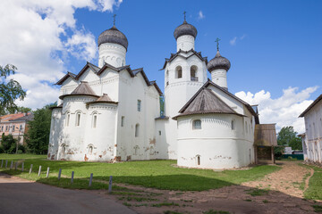 Fototapeta na wymiar Temples of the medieval former Spaso-Preobrazhensky monastery on a July afternoon. Staraya Russa, Russia