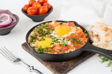 Shakshuka-a traditional Arabic dish made of eggs, peppers and tomatoes