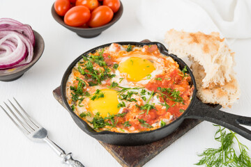 Shakshuka-a traditional Arabic dish made of eggs, peppers and tomatoes