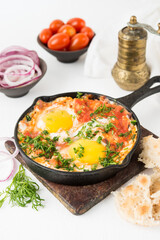 Shakshuka-a traditional Arabic dish made of eggs, peppers and tomatoes