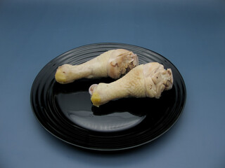 Boiled chicken leg meat. Two pieces of chicken drumstick.