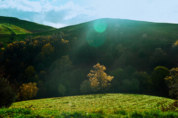 Sunshine over the hills in the countryside on an autumn day