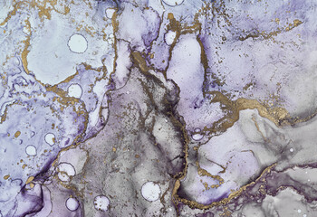 Alcohol ink art.Mixing liquid paints. Modern, abstract colorful background, wallpaper. Fluid marble art, texture,golden streaks, cracks.Translucent colors