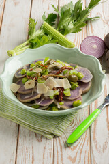 vegetables salad with purple potatoes broad beans sliced parmesan cheese