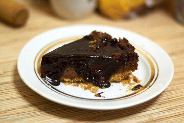 Chocolate cheesecake on a white plate