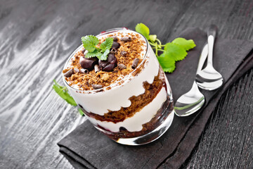 Dessert Black Forest in glass on wooden board