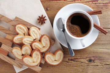 Heart-shaped cookies and coffee