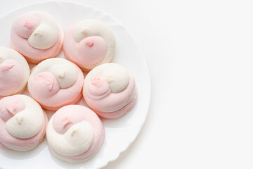 pink marshmallow on white background 