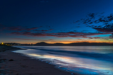 Fototapeta premium Pretty blue summer sunrise seascape with high cloud