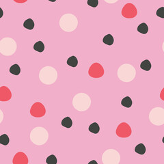 Big polka dots on pink background vector pattern