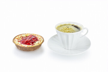 Strawberry tart with almond petals and porcelain white cup with coffee and saucer on white background