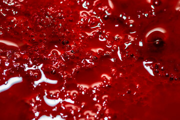 Real animal blood, gore close up macro shot for background.