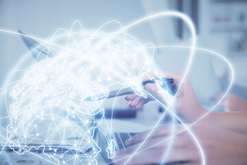 Multi exposure of woman hands typing on computer and business theme hologram drawing. Success...