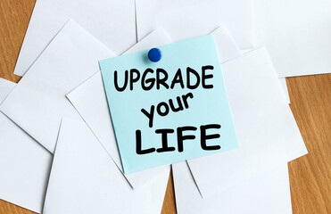 upgrade your life. the text on the sticker on the table.
