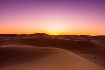 Fototapeta na wymiar sunset in the desert, Erg Chigaga Morocco 