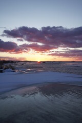 sunset over the sea with sea ice