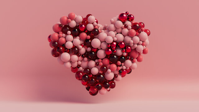 Multicolored Sphere Love Heart. Pink, Red Glass and Red Metallic Spheres arranged in a heart shape. 3D Render 