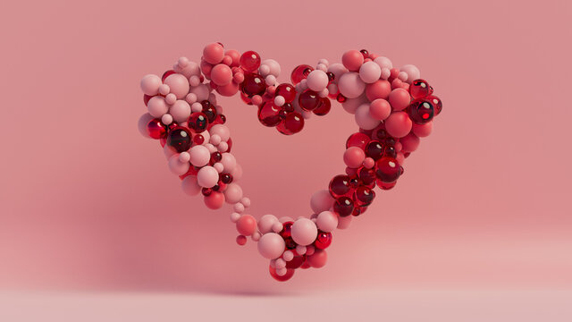 Multicolored Sphere Love Heart. Pink, Red Glass and Red Metallic Spheres arranged in a heart shape. 3D Render 