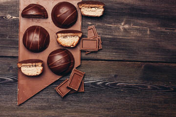 Marshmallow on chocolate sweets delicacy cocoa wooden table