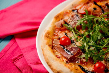 Christmas pizza on the wood board. Holiday celebration pizza. Italian cuisine concept.