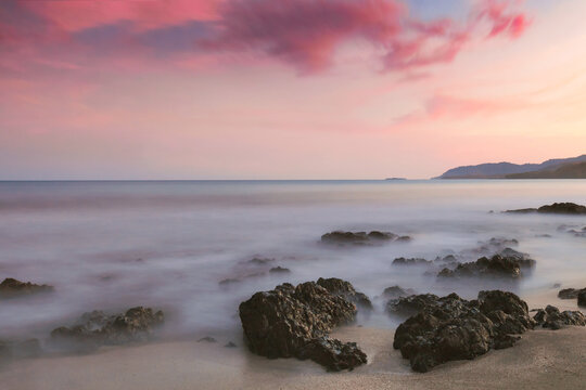 Landscape with long exposure: sunset coastline.