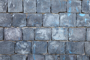 wall in blocks of volcanic stone