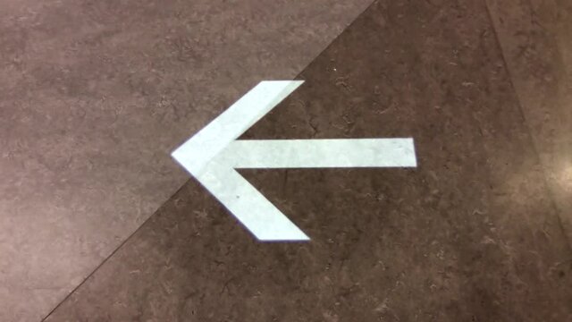 The motion of arrow sign on the floor at Ikea store