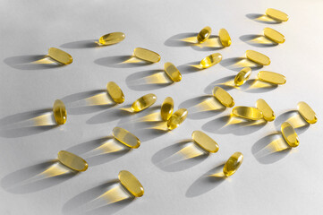 Oil-based capsules on light background.