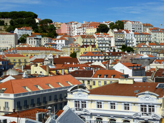 Obraz premium Beautiful view of Lisbon with white and yellow buildings in a sunny day