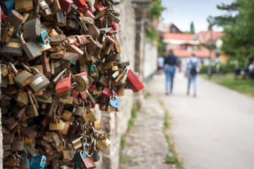 Many locks on the gate in old city