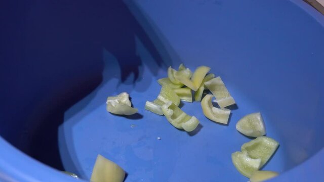 Cutting peppers into small pieces - (4K)