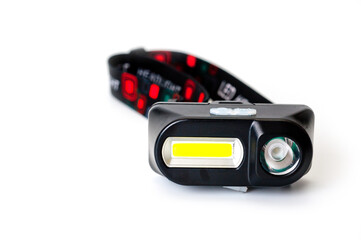 LED headlamp with two light sources for tourism, sports and work.