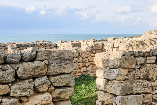 ruins of antique walls on the seashore