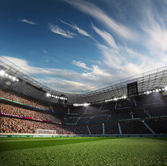 Empty soccer stadium in the evening light