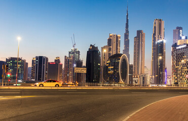 Fototapeta na wymiar Dubai, UAE - 02.12.2021 Evening hour in Marasi drive, Business Bay District. Outdoors