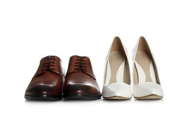 Classic wedding shoes for bride and groom on white background