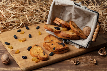 Delicious sweet bread roll on wooden background