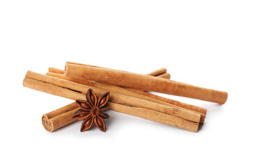 Aromatic cinnamon sticks and anise isolated on white