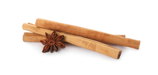 Aromatic cinnamon sticks and anise isolated on white