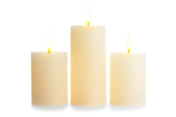 Glowing candles on white background