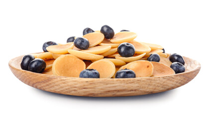 Plate of tasty pancakes with fresh blueberry on white background