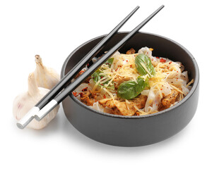 Bowl with tasty noodles, chicken and chopsticks on white background