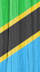 The flag of Tanzania on dry wooden surface, cracked with age. Mobile phone wallpaper with Tanzanian national symbol. Bright vertical background or backdrop