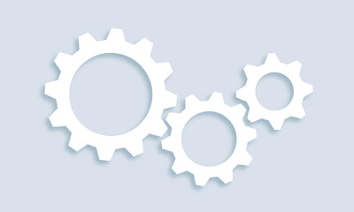 Mechanical gears in light blue background.