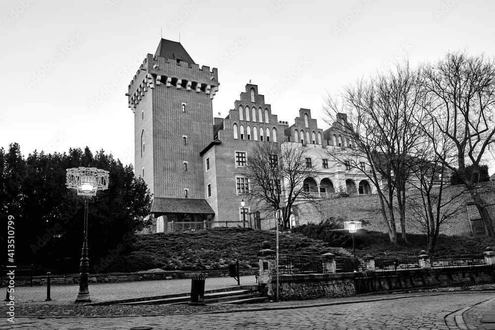 Wall mural red brick tower reconstructed royal castle  in the evening