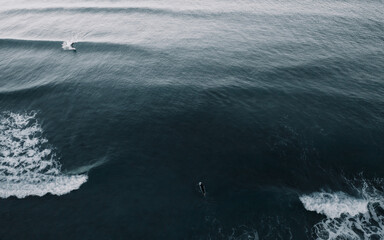Open seas with surfers